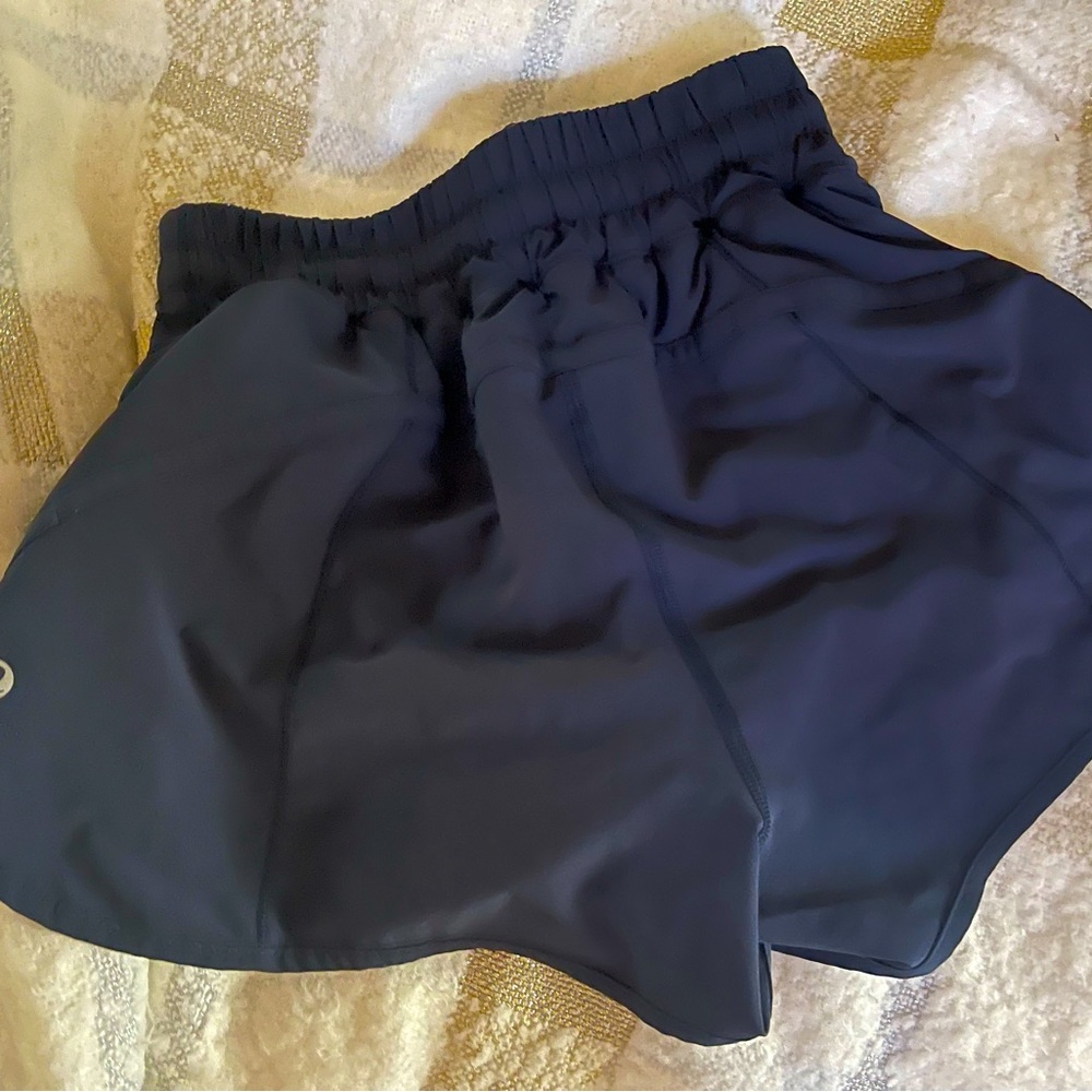 Brand new Lululemon hotty hot shorts, navy in color. 2.5 inseam